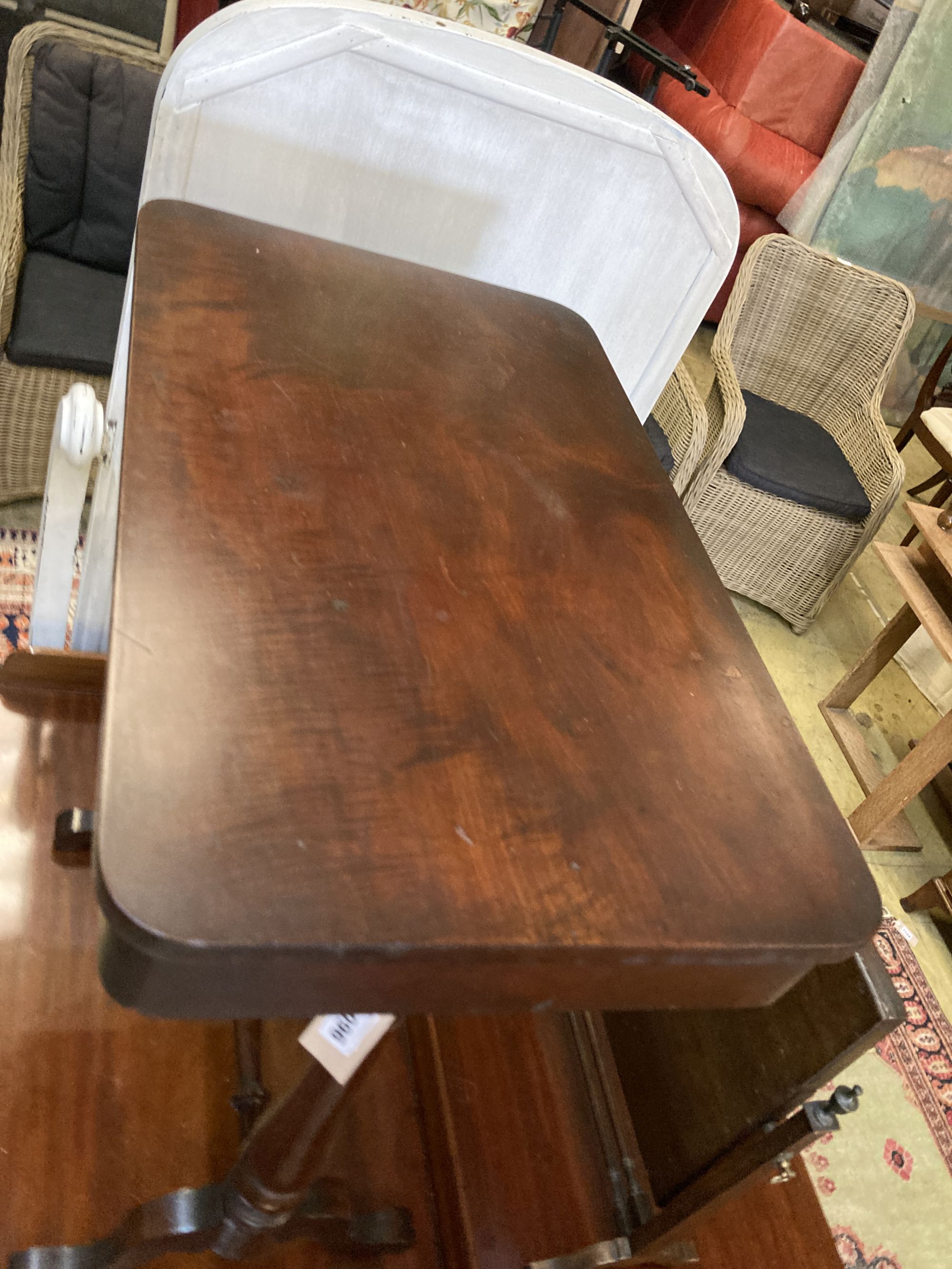 A Victorian mahogany stretcher table, width 62cm, depth 38cm, height 73cm